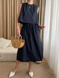 xakxx Loose Solid Color Round-Neck Vest + High Waisted  Skirt Two Pieces Set