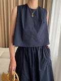 xakxx Loose Solid Color Round-Neck Vest + High Waisted  Skirt Two Pieces Set